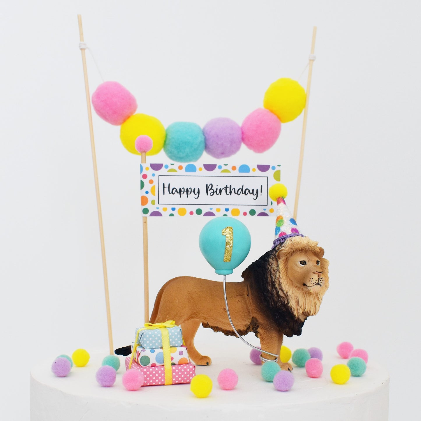 bright rainbow lion cake topper