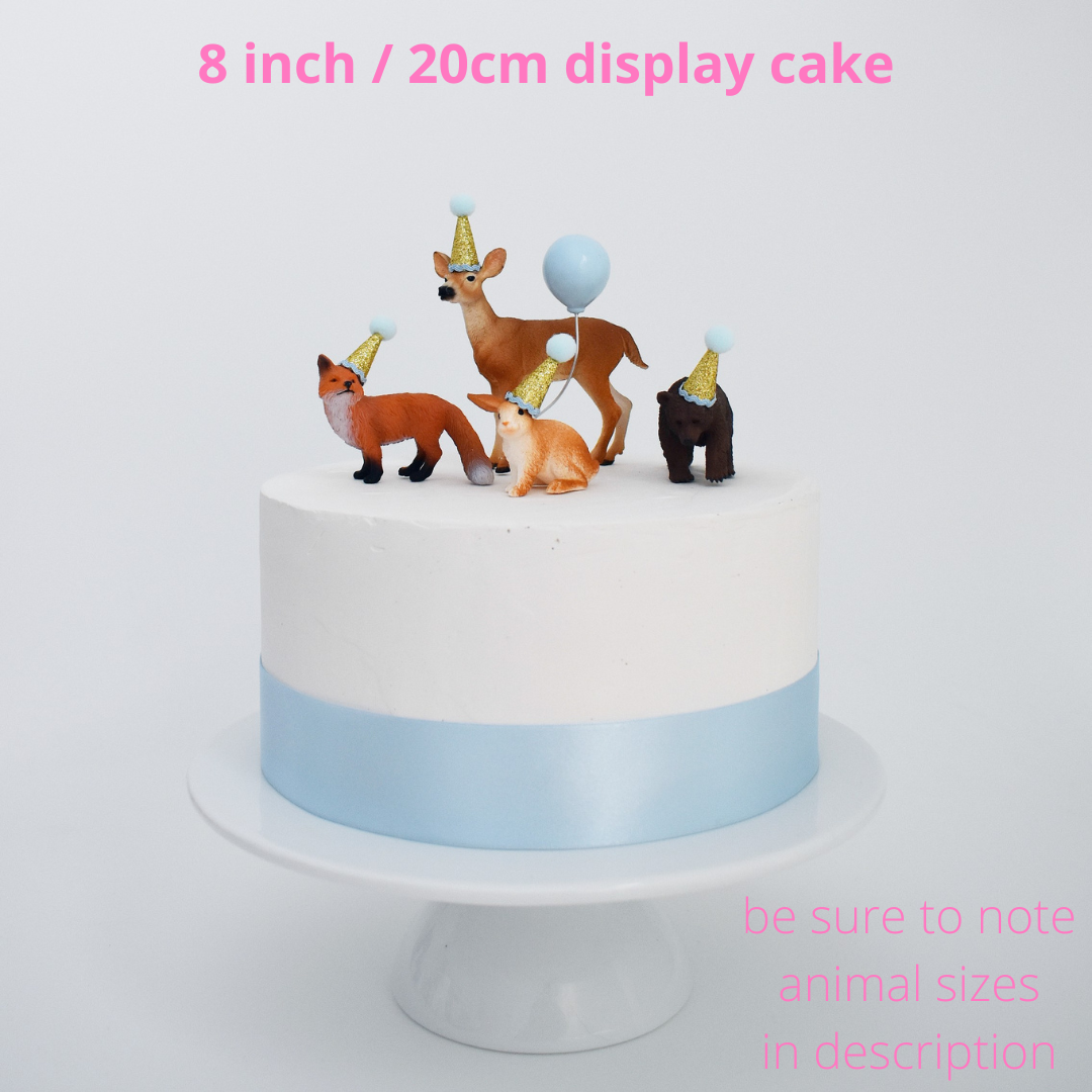 blue woodland animal theme birthday cake
