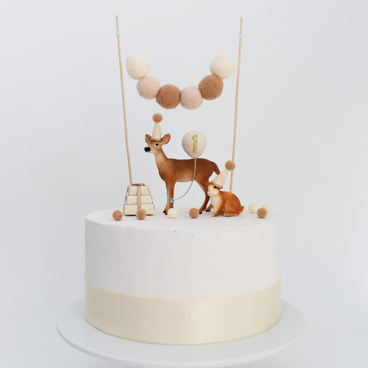 woodland animals with neutral party hats
