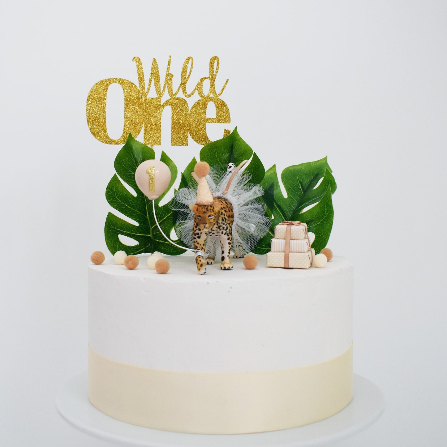 wild one leopard birthday cake