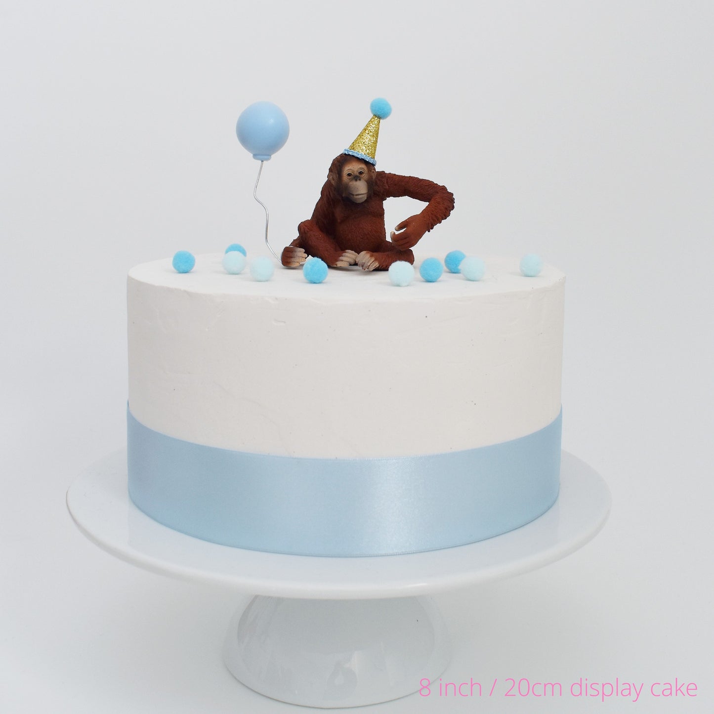 orangutan with party hat