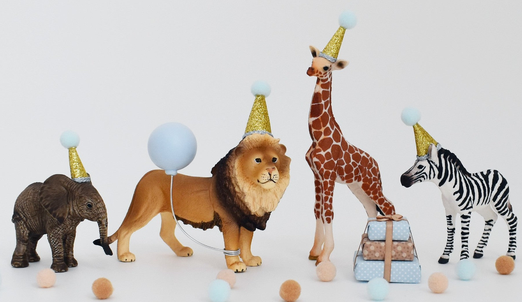 safari animal cake toppers with party hats and balloons for safari or jungle or wild one theme birthday cake