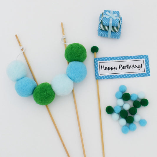 blue and green cake topper set