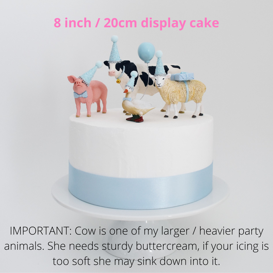 farm animals with blue party hats cake decorations