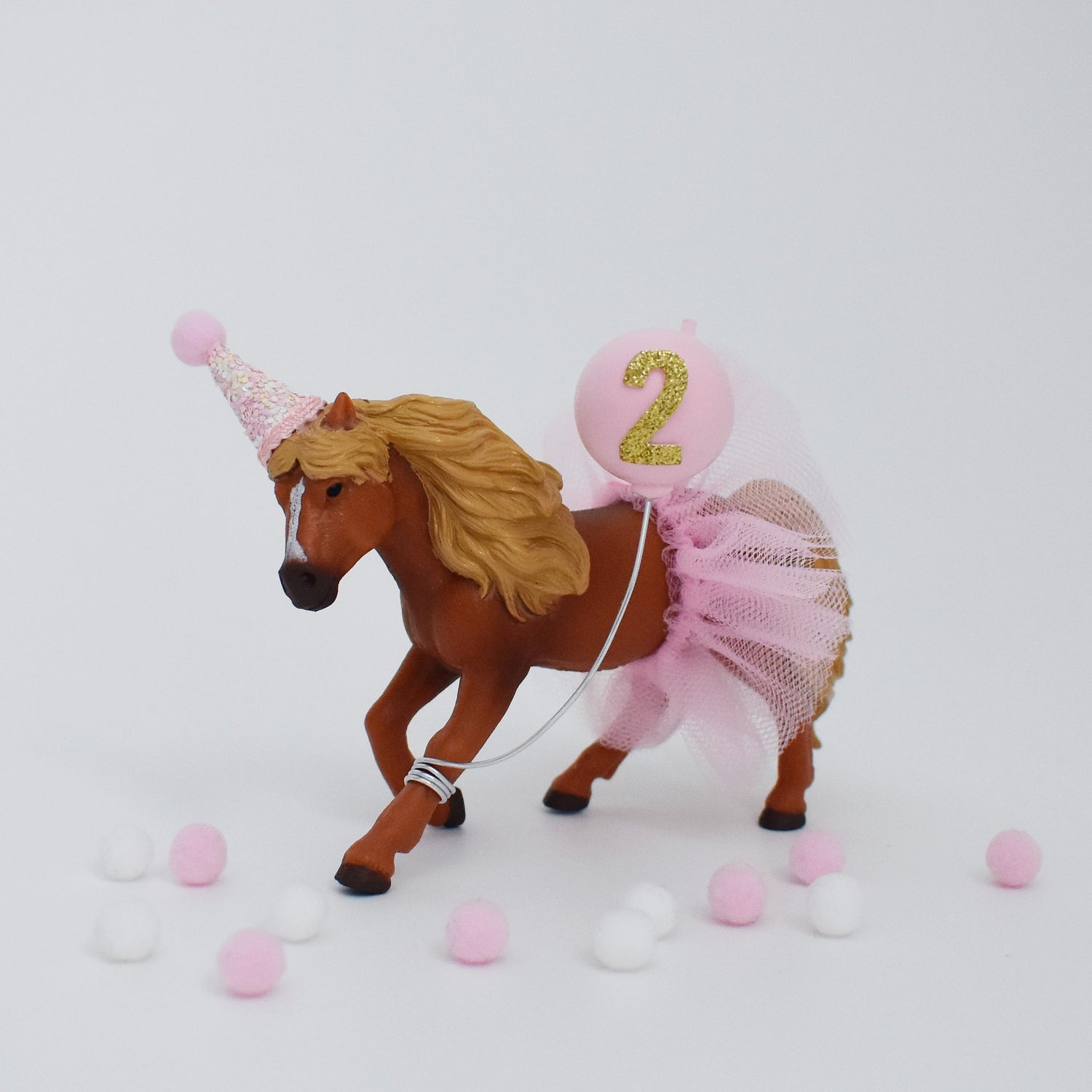 horse with pink party hat and tutu