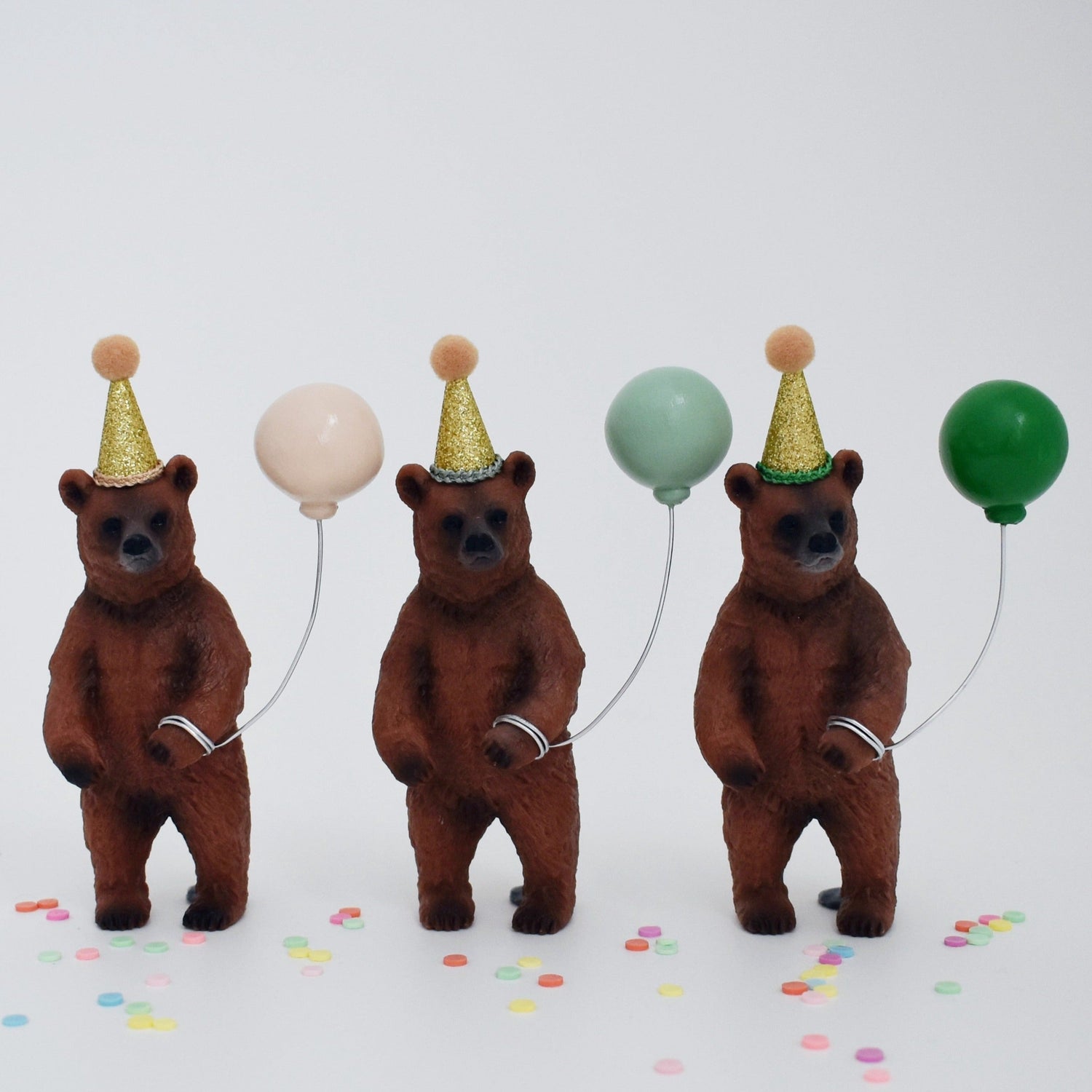 Bear cake topper with party hat and balloon