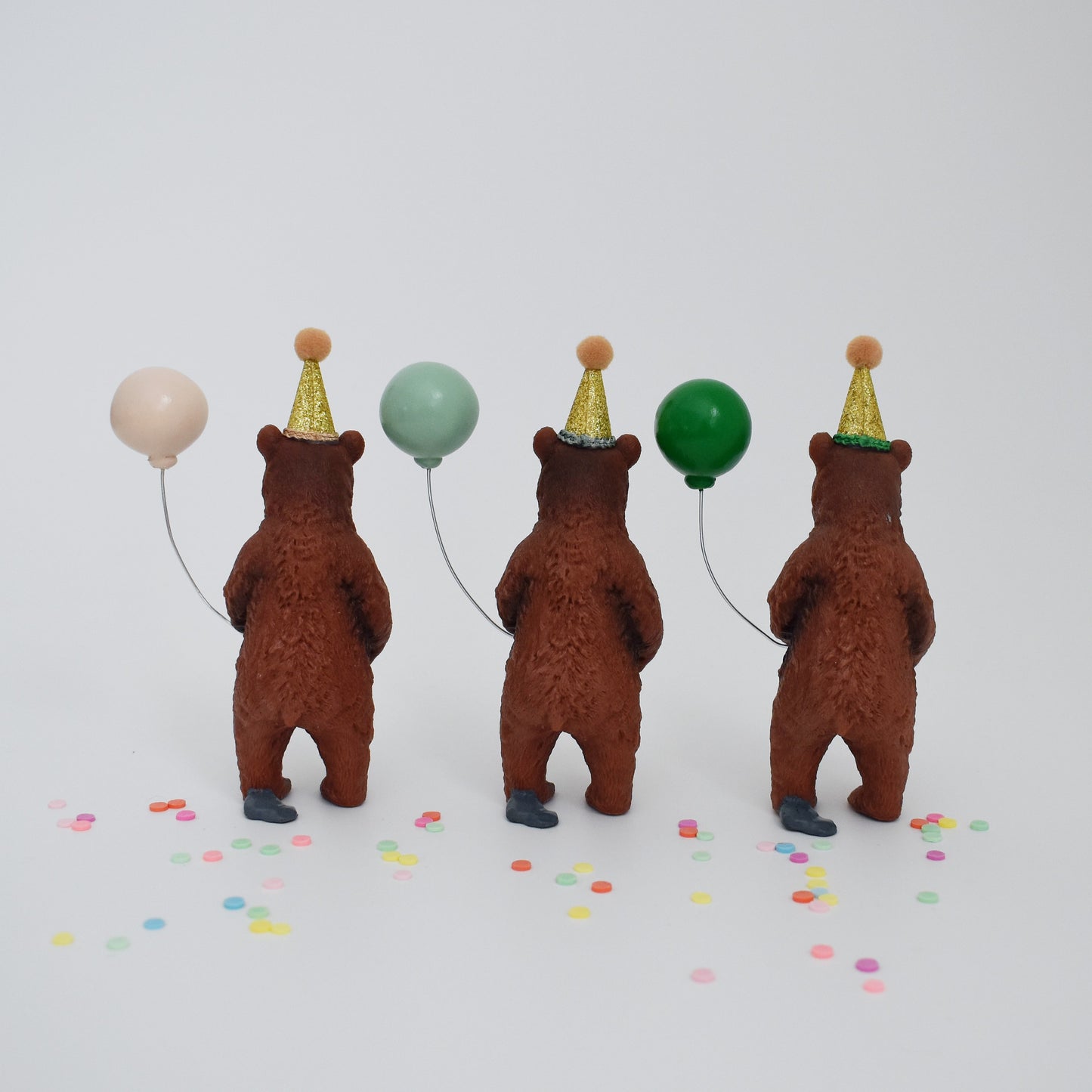 bear with balloon and party hat