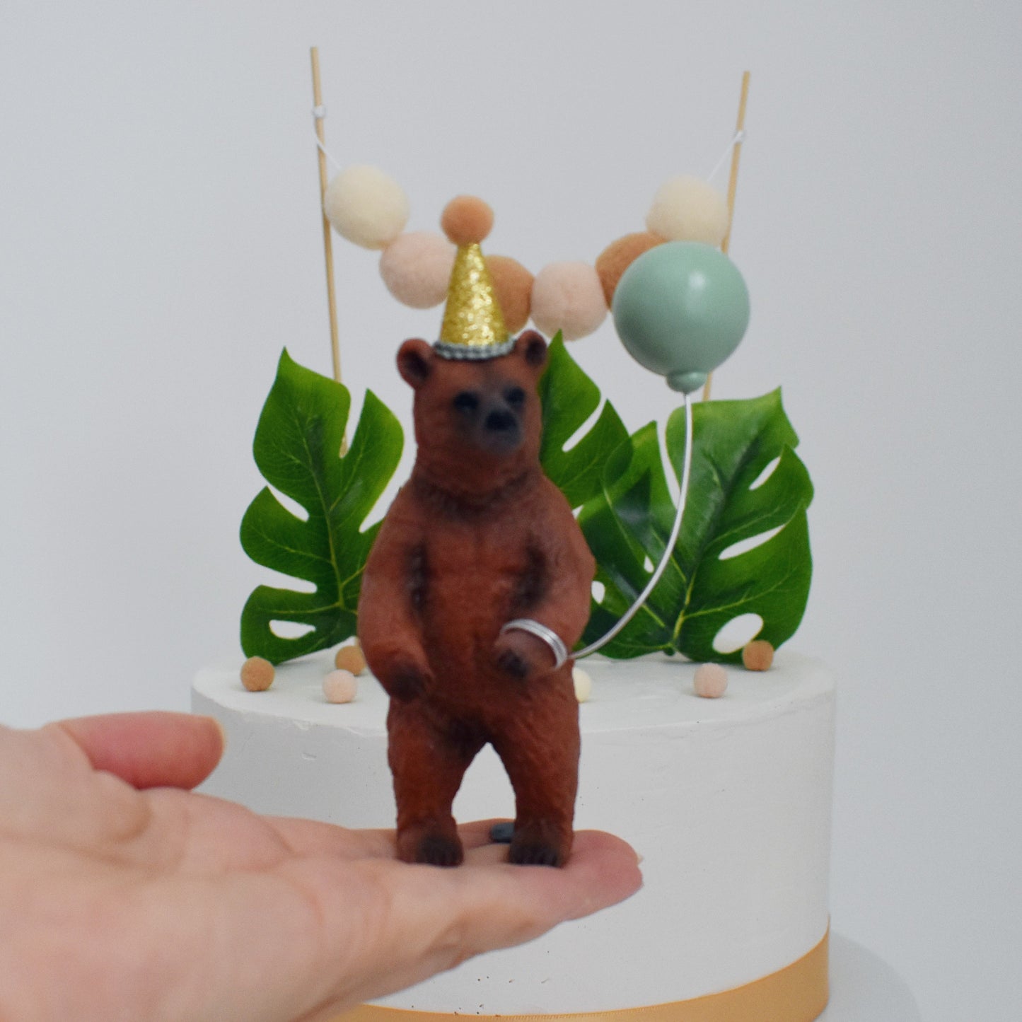 bear cake topper with sage balloon 