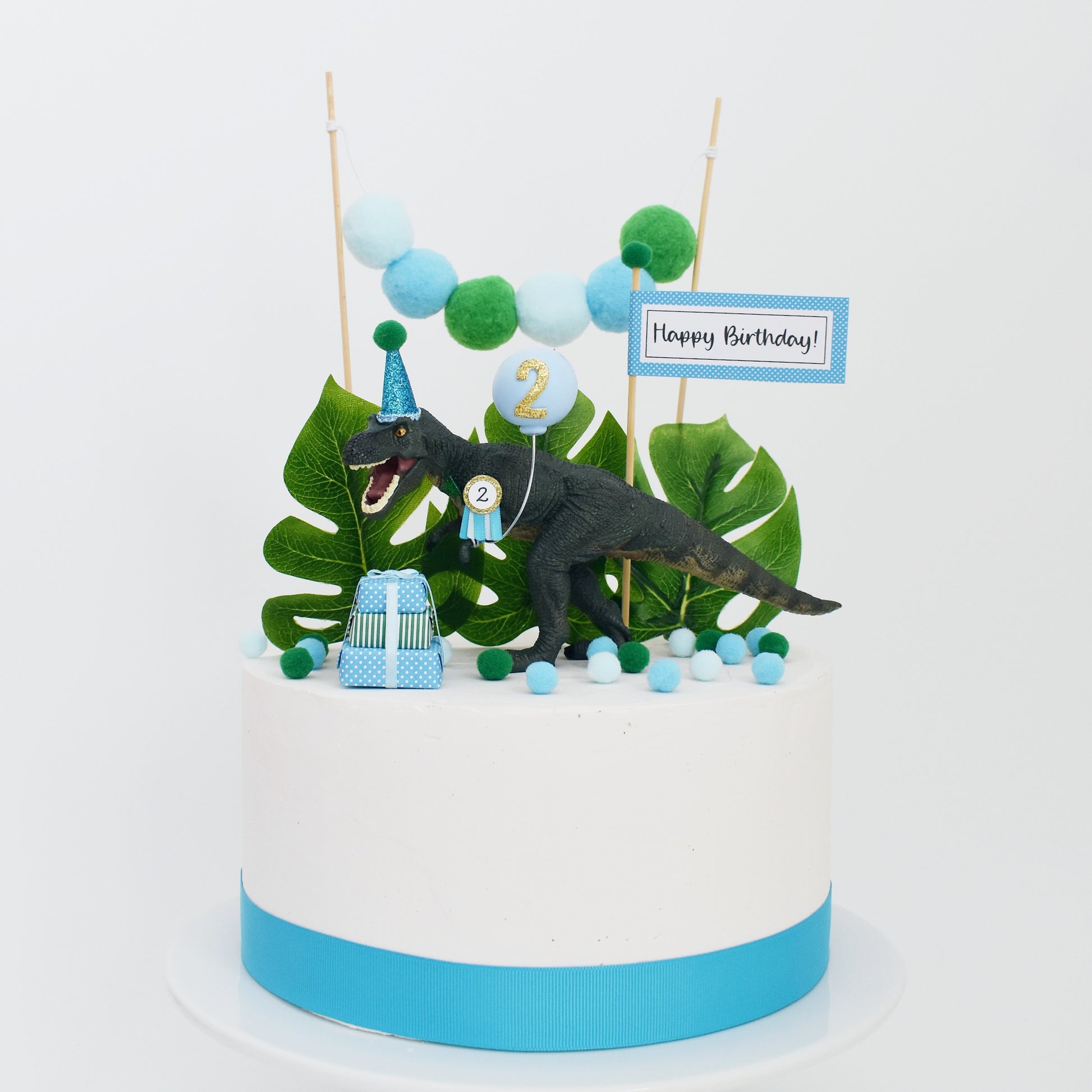 dino theme 2nd birthday cake