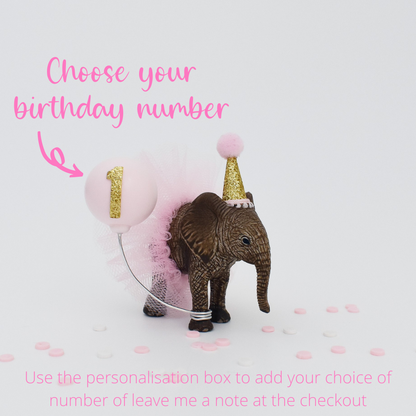 pink and gold elephant cake topper