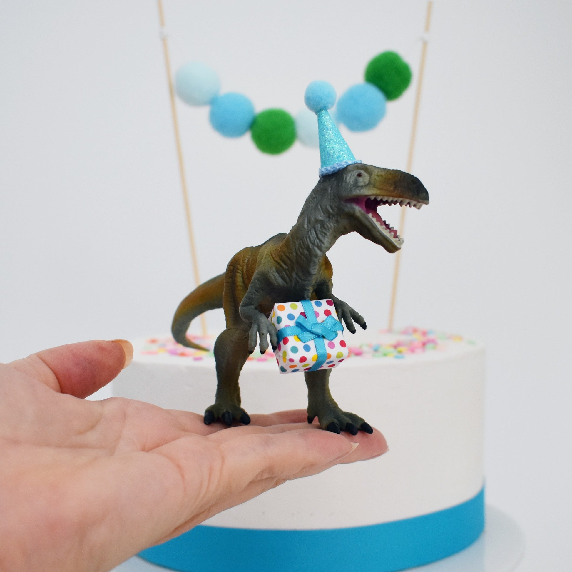 dinosaur theme cake topper