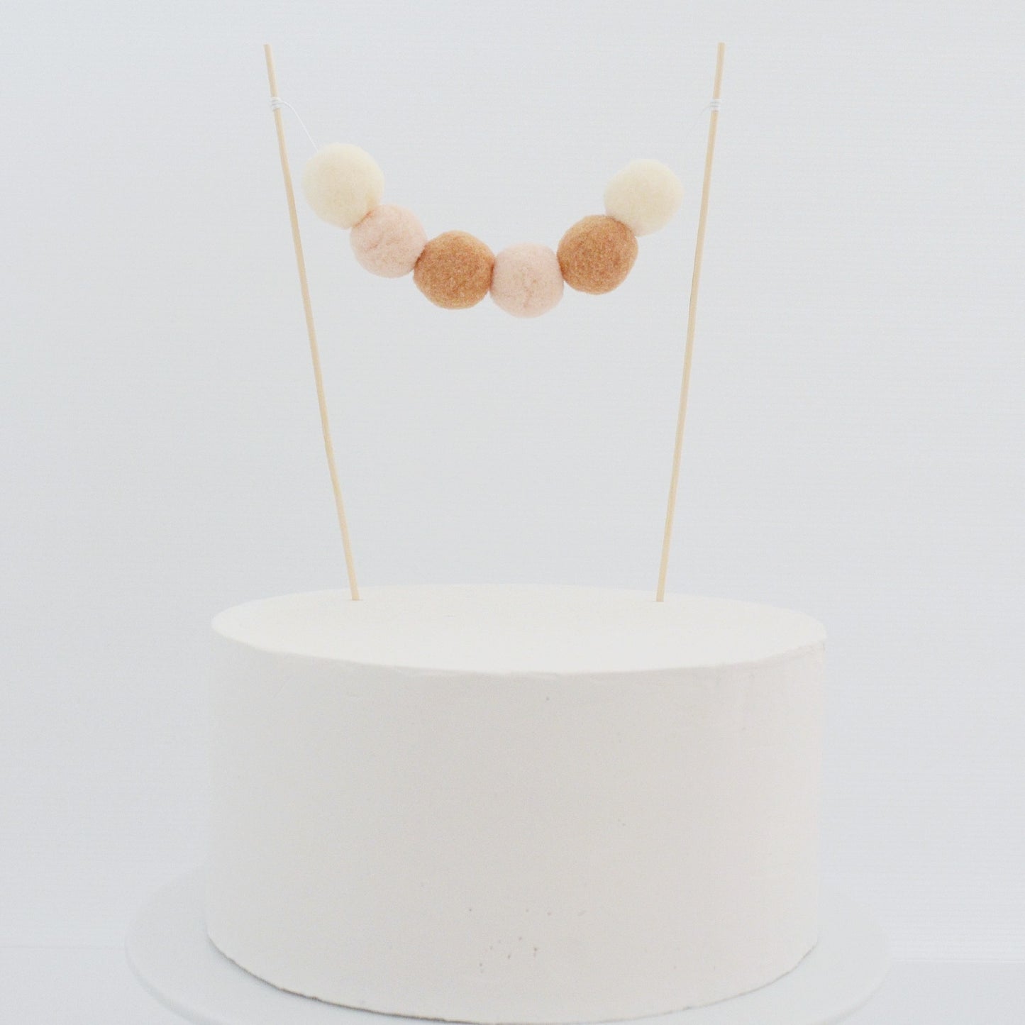 Pom Pom Garland Cake Topper in Neutral / Natural / Earthy tones