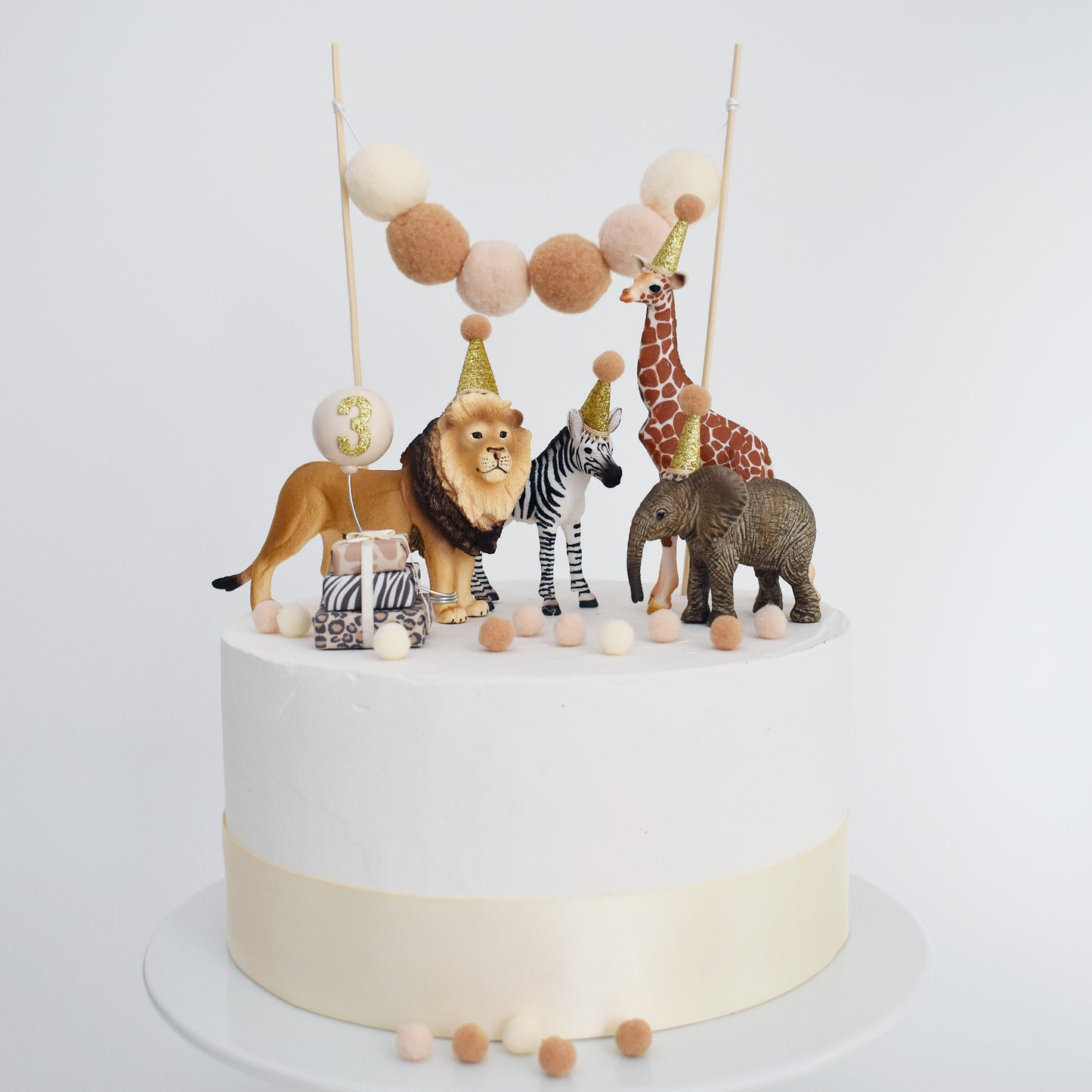 neutral safari cake theme